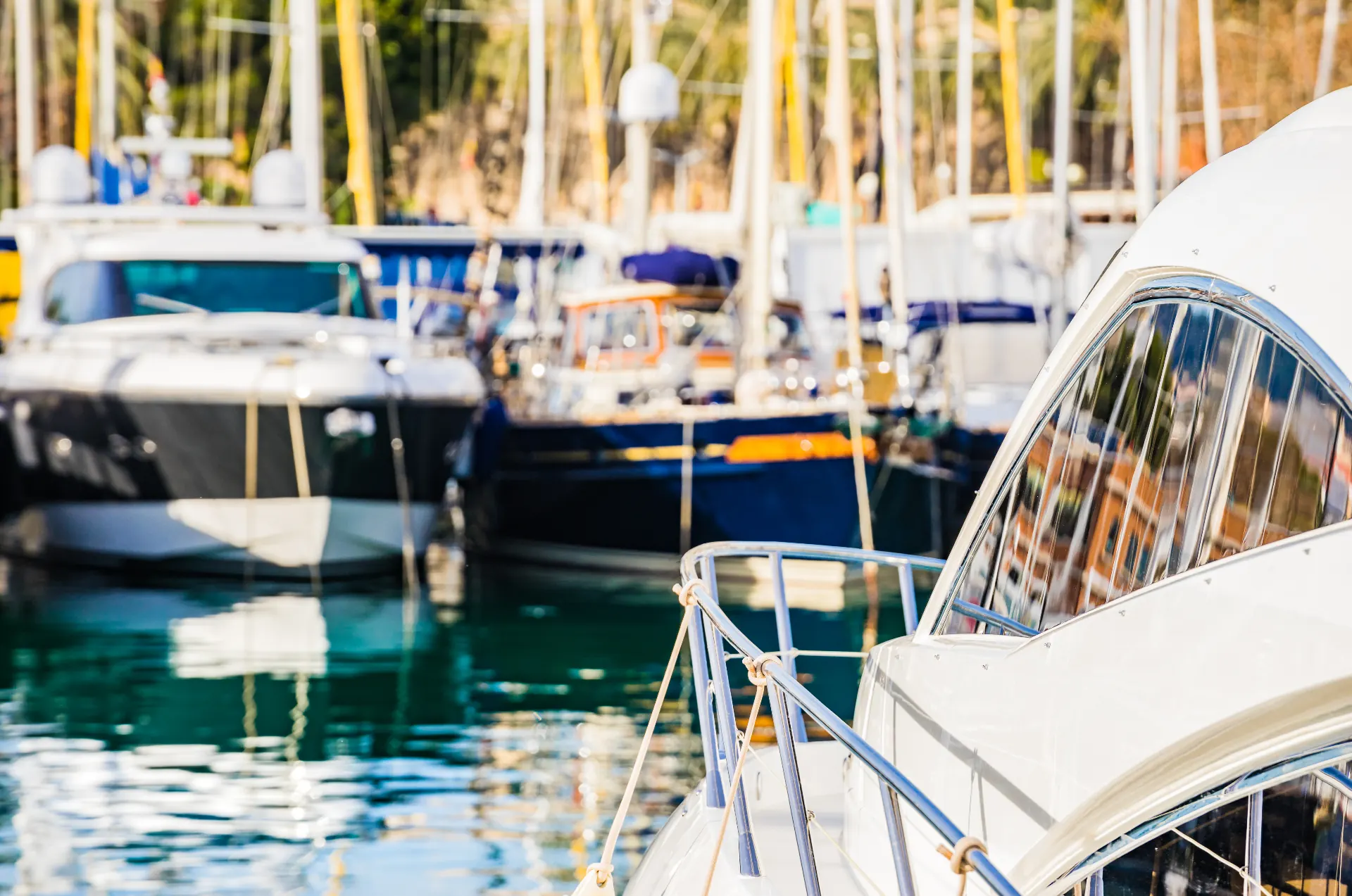 Boats moored at a marina harbour